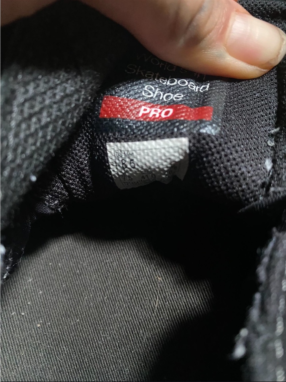 Vans Black Skateboard Shoe with Red Accent
